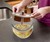 Securing Lid on Self-Stirring Microwave Bowl