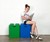 Girl Sitting on LEGO Recycling Bins