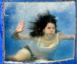 Girl in View Window of Backyard Dunk Tank