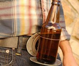 The BevBuckle - Retractable Drink Holder Belt Buckle
