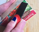 Thumb Scraper Sticker & Gunk Remover