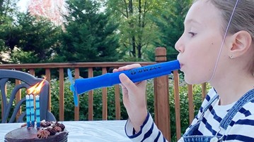 Blowzee Fan for Blowing Out Birthday Candles