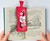 Bookie Cushion - Whoopee Cushion Bookmark Bookie Cushion - Whoopee Cushion Bookmark