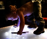 Toddler on LED Interactive Table