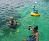 Two Guys Using Snorkel Hookah