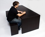 Jay Watson Sitting on His Heat Sensitive Table