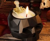 Skeleton in a Skull Bathtub Candle