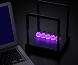 Kinetic Light Newton's Cradle