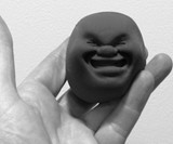 Smooshy Face Stress Ball Black Smile