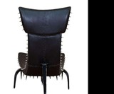 Backstabber Occasional Chair