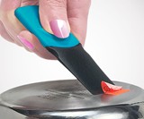 Thumb Scraper Sticker & Gunk Remover