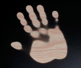 Handprint on Heat Sensitive Table