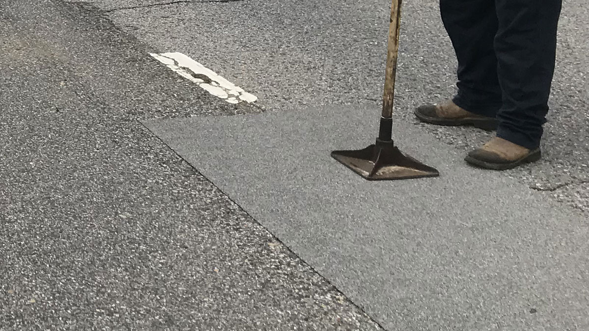 American Road Patch - Peel & Seal Pothole Repair American Road Patch - Peel & Seal Pothole Repair