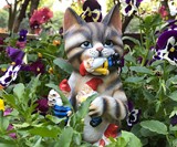 Cat Eating the Garden Gnomes Statue