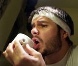 Guy Drinking from Cliff Hanger Mug