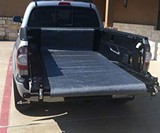 LoadHandler Truck Bed Unloader