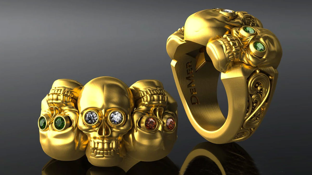 Solid Gold Three Skull Ring with Diamond Eyes Solid Gold Three Skull Ring with Diamond Eyes