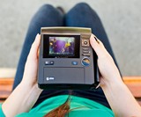 Polaroid Z340 Instant Camera in Girl's Lap