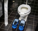 Crapper Concealer - Toilet Stall Shoe Covers