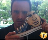 Aaron Paul Holding Pinkman Chuck Taylors