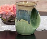 Clay in Motion Handwarmer Mugs