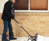 The Snowcaster Wheeled Snow Pusher & Barn Shovel