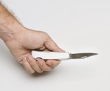 Man Holding Hobo Knife