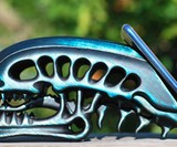 Wooden Alien Skull Phone Stand