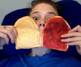 Kid Holding Peanut Butter & Jelly Wallet